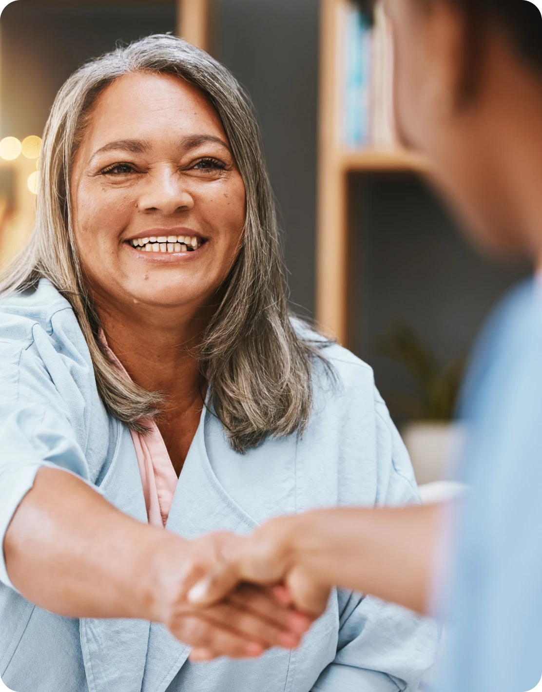 Patient shaking hands