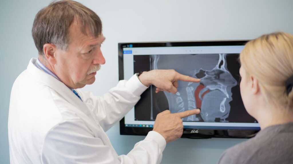Steve with patient talking about results